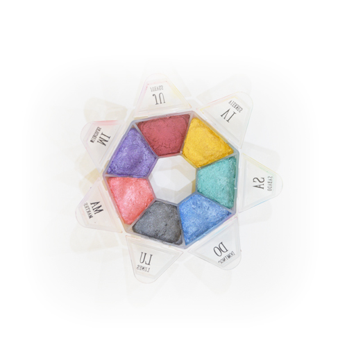 Carrusel Metálico.  Contenido Neto. 70g
